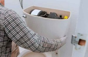 plumber investigating toilet stoppages katy - plumbing stoppage